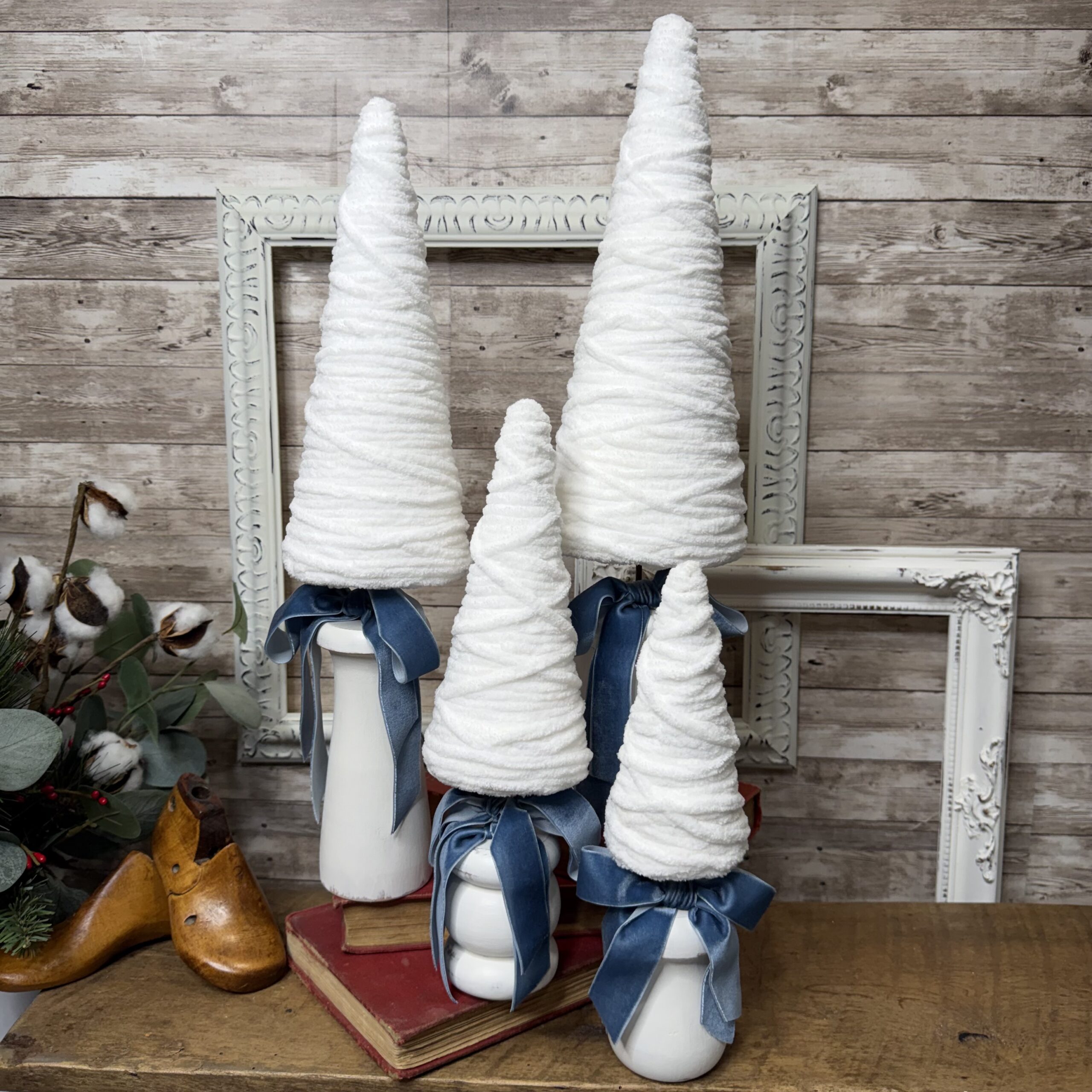 Elegant White Christmas Trees on Spindle Base